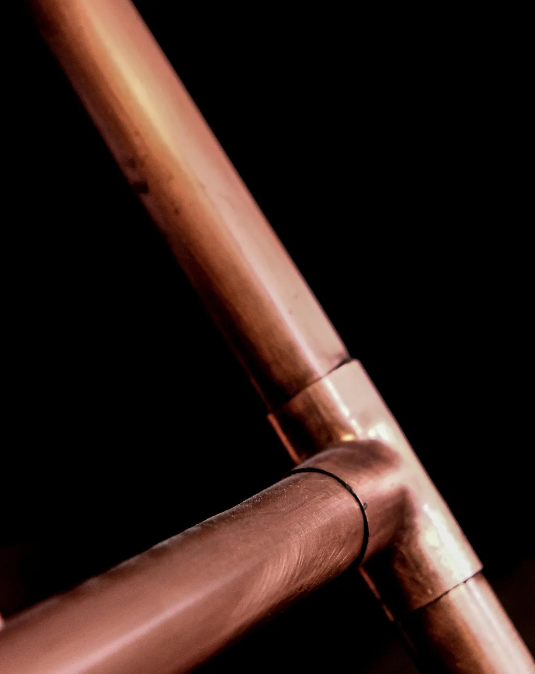 Close-up of soldered copper pipework